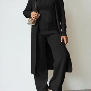 Chic Black Wide Leg 3-piece suit one size fits 4-16 body conform & flattering.